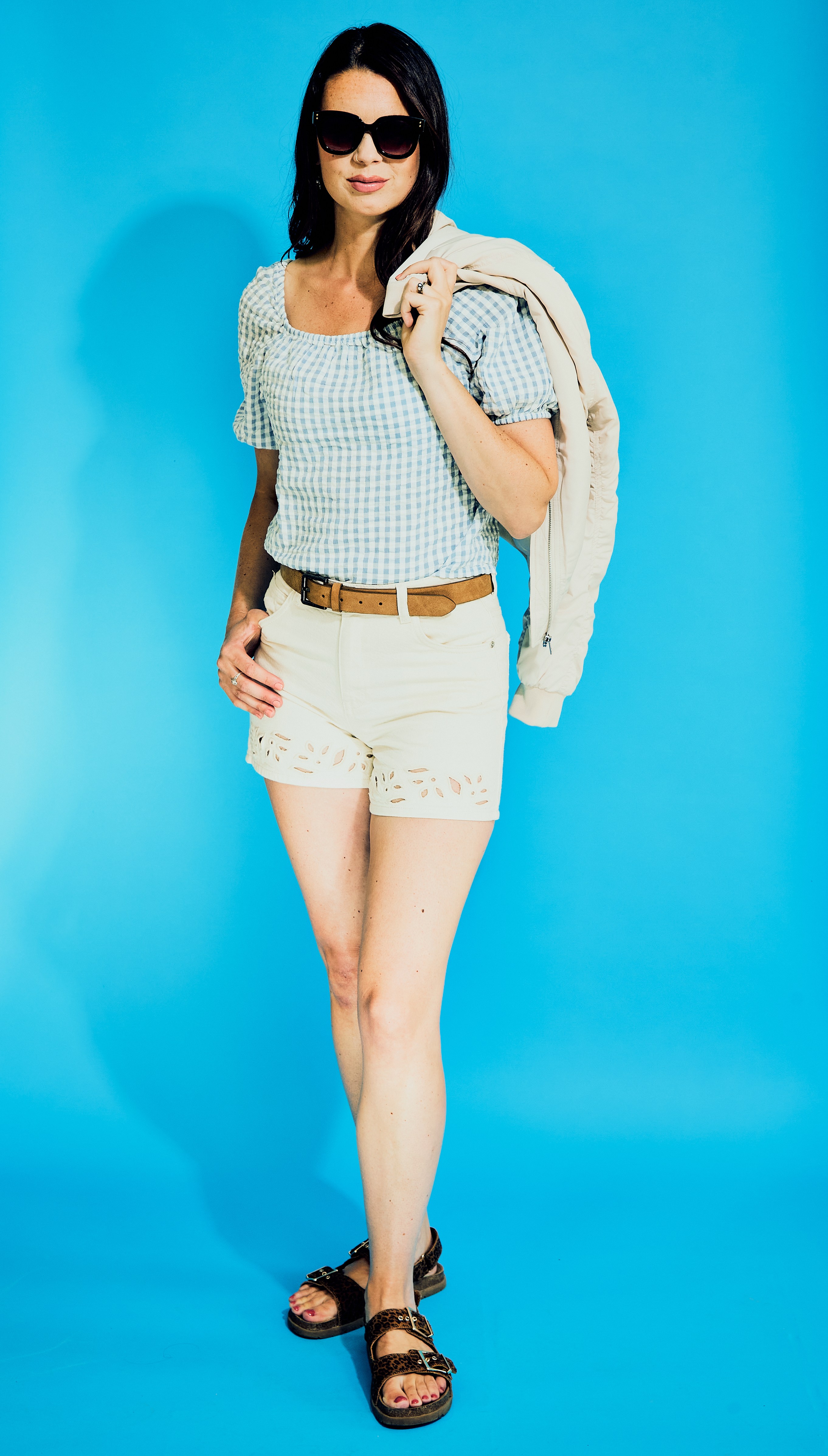 Individual showcasing a summer outfit.
